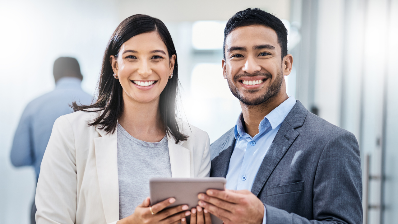 mal and female young professionals in office setting 